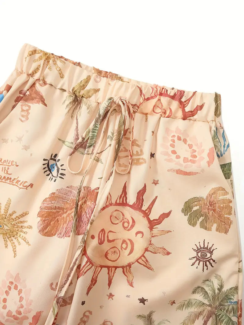 Mode Outlet | Boho Broek met Wijde Pijpen – Mystieke Print & Relaxte Pasvorm