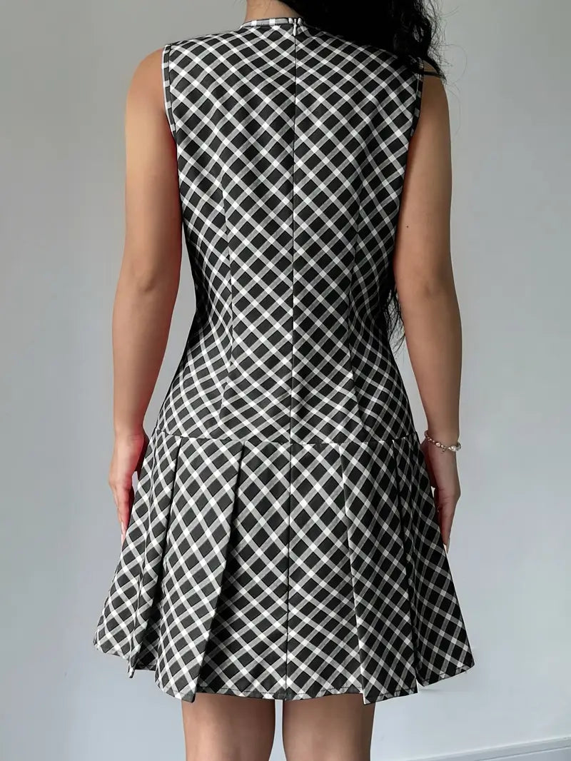 Mode Outlet | Stijlvolle Mouwloze Jurk met Plooien – Tijdloze Elegantie