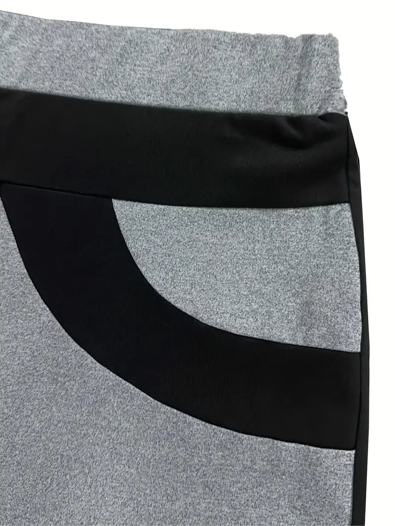Mode Outlet | Stijlvolle Broek met Wijde Pijpen – Trendy Kleurblokdesign