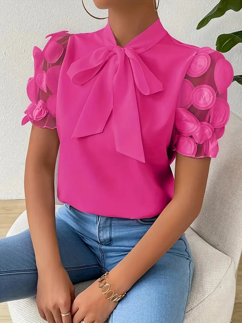 Mode Outlet | Elegante Blouse met Strikdetail & Netstof Mouwen