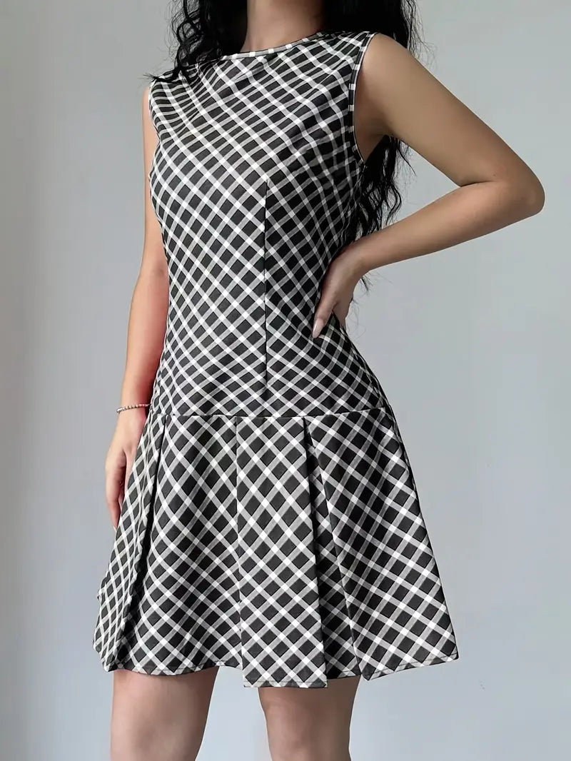 Mode Outlet | Stijlvolle Mouwloze Jurk met Plooien – Tijdloze Elegantie